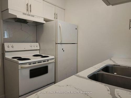 2-207 Trent St E, Whitby, ON - Indoor Photo Showing Kitchen With Double Sink