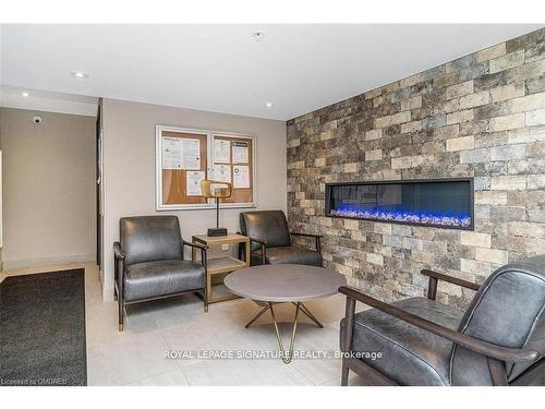 508-610 Farmstead Dr, Milton, ON - Indoor Photo Showing Living Room With Fireplace