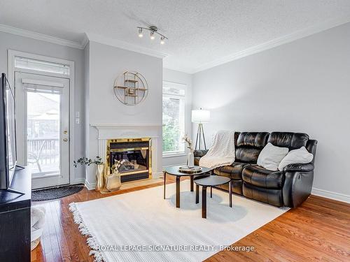 145-2025 Meadowgate Blvd, London, ON - Indoor Photo Showing Living Room With Fireplace