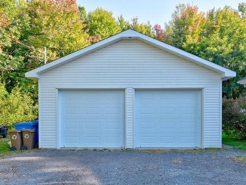 Garage - 55Z  - 57Z Rue Du Domaine, Lavaltrie, QC - Outdoor With Exterior