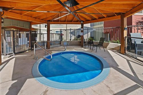 204-3865 Truswell Road, Kelowna, BC - Outdoor With In Ground Pool With Exterior