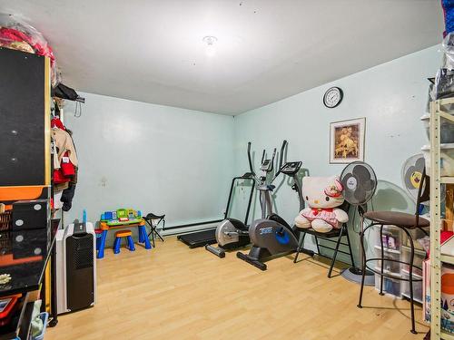 Salle familiale - 1701 36E Avenue, Montréal (Rivière-Des-Prairies/Pointe-Aux-Trembles), QC - Indoor Photo Showing Gym Room