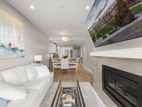 308-1820 Maple Ave South, Sooke, BC - Indoor Photo Showing Living Room With Fireplace