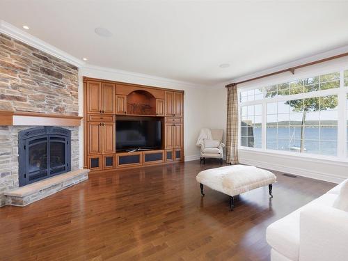 Family room - 58 Rue Main, Hudson, QC - Indoor Photo Showing Living Room With Fireplace