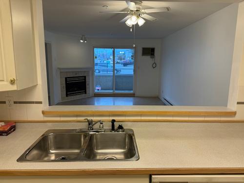 102-2401 South Main Street, Penticton, BC - Indoor Photo Showing Kitchen With Double Sink