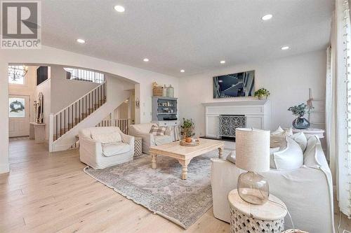 41 Strathlea Court Sw, Calgary, AB - Indoor Photo Showing Living Room With Fireplace