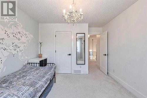 41 Strathlea Court Sw, Calgary, AB - Indoor Photo Showing Bedroom