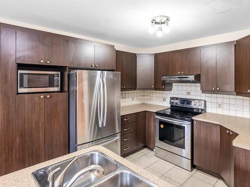 Cuisine - 5018 Rue Périard, Montréal (Pierrefonds-Roxboro), QC - Indoor Photo Showing Kitchen With Double Sink