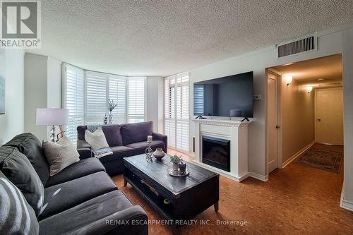 108 - 1225 North Shore Boulevard, Burlington, ON - Indoor Photo Showing Living Room With Fireplace