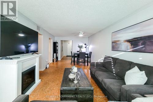 108 - 1225 North Shore Boulevard, Burlington, ON - Indoor Photo Showing Living Room With Fireplace