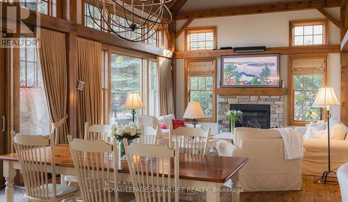 103 Hoggard Court, Blue Mountains, ON - Indoor Photo Showing Dining Room With Fireplace