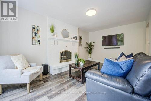 52 Notchwood Court, Kitchener, ON - Indoor Photo Showing Living Room With Fireplace