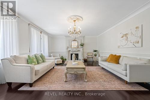 1081 Vansickle Road N, St. Catharines, ON - Indoor Photo Showing Living Room With Fireplace