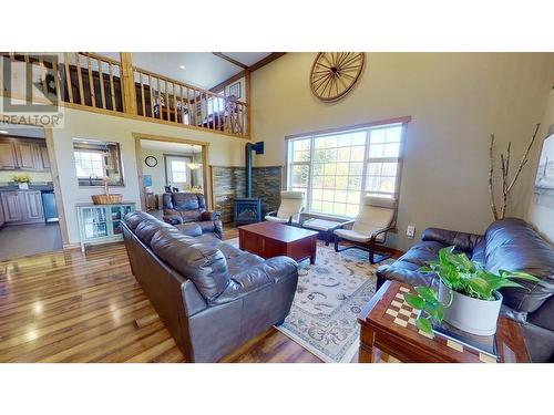 14214 250 Road, Fort St. John, BC - Indoor Photo Showing Living Room With Fireplace