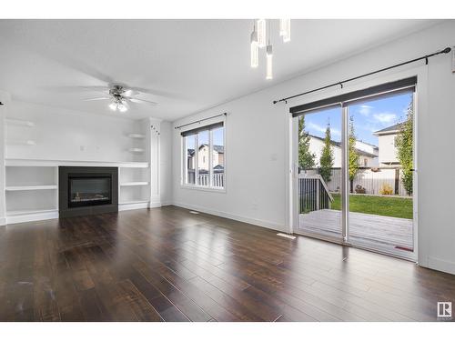 15124 31 St Nw, Edmonton, AB - Indoor Photo Showing Living Room With Fireplace