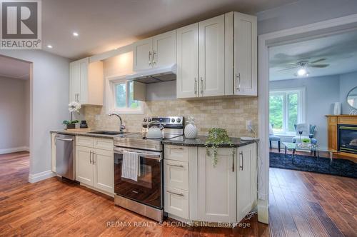 48 Westmount Road S, Waterloo, ON - Indoor Photo Showing Kitchen With Fireplace