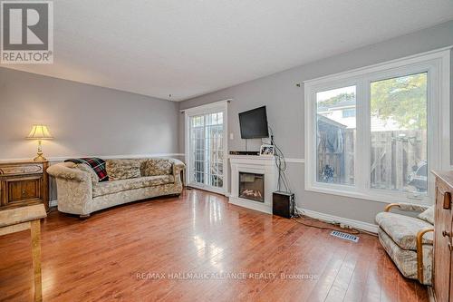 3 - 2228 Upper Middle Road, Burlington, ON - Indoor Photo Showing Living Room With Fireplace