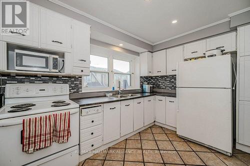 3 - 2228 Upper Middle Road, Burlington, ON - Indoor Photo Showing Kitchen With Double Sink