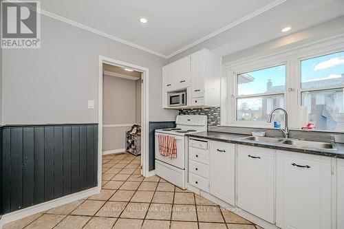 3 - 2228 Upper Middle Road, Burlington, ON - Indoor Photo Showing Kitchen With Double Sink