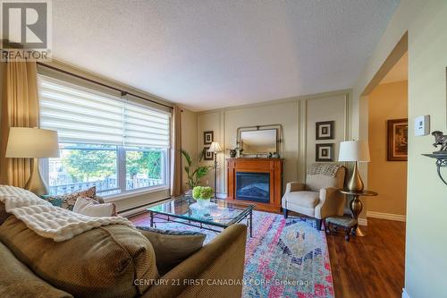 760 Berkshire Drive, London, ON - Indoor Photo Showing Living Room With Fireplace