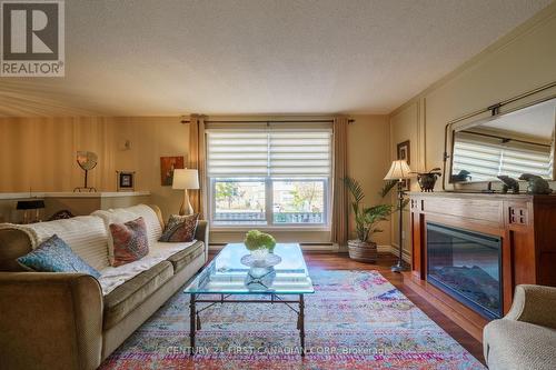 760 Berkshire Drive, London, ON - Indoor Photo Showing Living Room With Fireplace