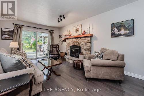 12 Jo Ann Crescent, Centre Wellington, ON - Indoor Photo Showing Living Room With Fireplace