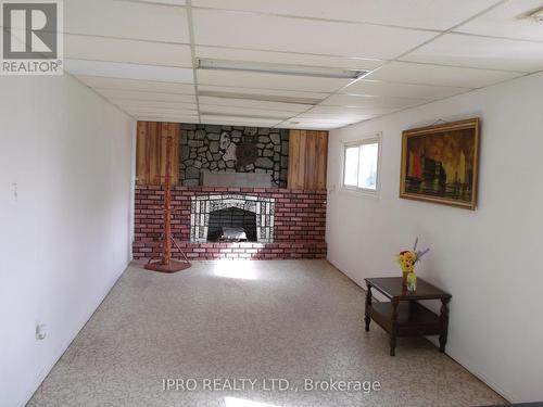 3376 Cattell Drive, Niagara Falls, ON - Indoor Photo Showing Other Room With Fireplace