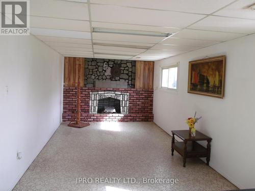 3376 Cattell Drive, Niagara Falls, ON - Indoor Photo Showing Other Room With Fireplace