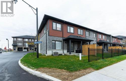 22 - 106 Court Drive, Brant, ON - Outdoor With Facade