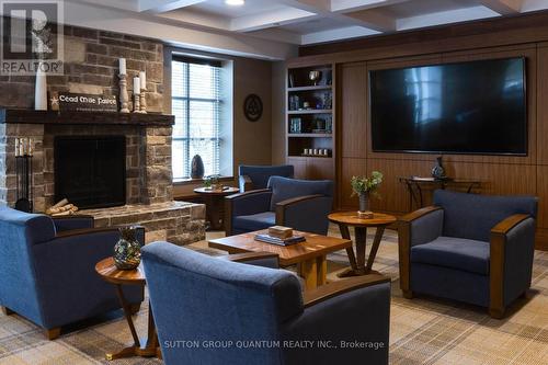 1209 - 1665 The Collegeway, Mississauga, ON - Indoor Photo Showing Living Room With Fireplace