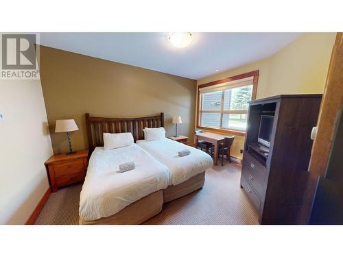 4559 Timberline  Crescent Unit# 612C, Fernie, BC - Indoor Photo Showing Bedroom