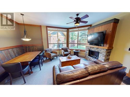 4559 Timberline  Crescent Unit# 612C, Fernie, BC - Indoor Photo Showing Living Room With Fireplace