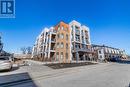 101 - 120 Canon Jackson Drive, Toronto, ON  - Outdoor With Facade 