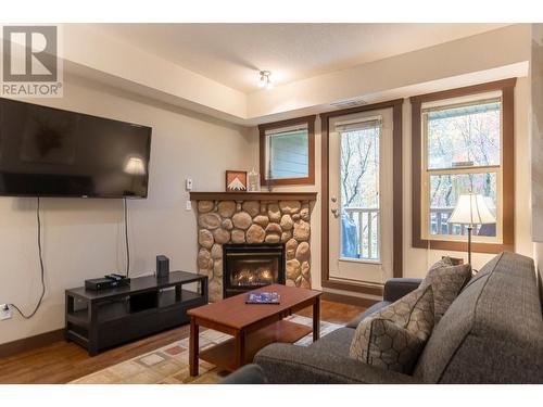 1500 Mcdonald  Avenue Unit# 122, Fernie, BC - Indoor Photo Showing Living Room With Fireplace