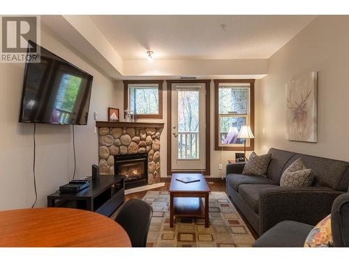 1500 Mcdonald  Avenue Unit# 122, Fernie, BC - Indoor Photo Showing Living Room With Fireplace