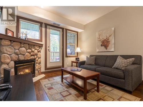 1500 Mcdonald  Avenue Unit# 122, Fernie, BC - Indoor Photo Showing Living Room With Fireplace