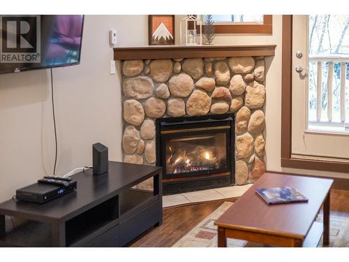 1500 Mcdonald  Avenue Unit# 122, Fernie, BC - Indoor Photo Showing Living Room With Fireplace