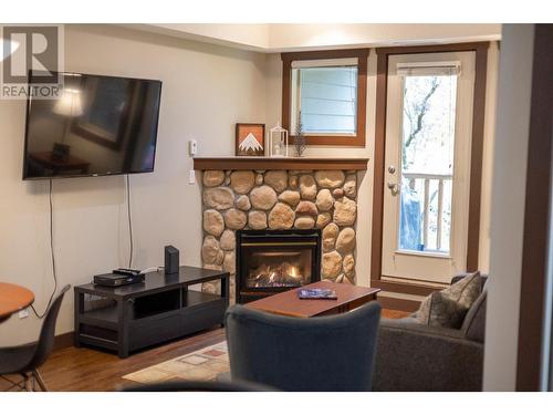 1500 Mcdonald  Avenue Unit# 122, Fernie, BC - Indoor Photo Showing Living Room With Fireplace