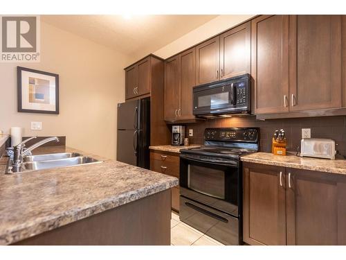 1500 Mcdonald  Avenue Unit# 122, Fernie, BC - Indoor Photo Showing Kitchen With Double Sink