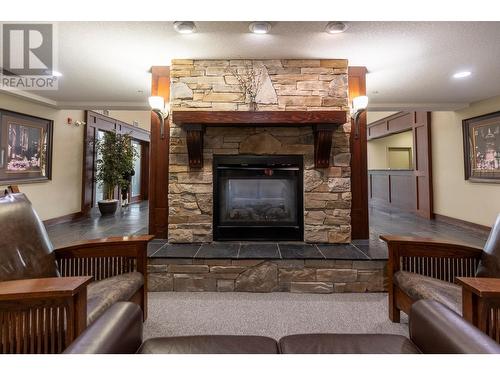 1500 Mcdonald  Avenue Unit# 122, Fernie, BC - Indoor Photo Showing Living Room With Fireplace