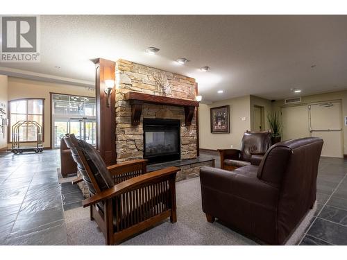 1500 Mcdonald  Avenue Unit# 122, Fernie, BC - Indoor Photo Showing Living Room With Fireplace