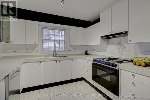 2239 Gerrard Street E, Toronto, ON - Indoor Photo Showing Kitchen With Double Sink