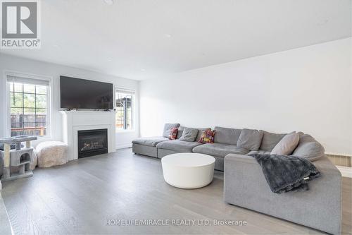 76 Jennings Drive N, Clarington, ON - Indoor Photo Showing Living Room With Fireplace