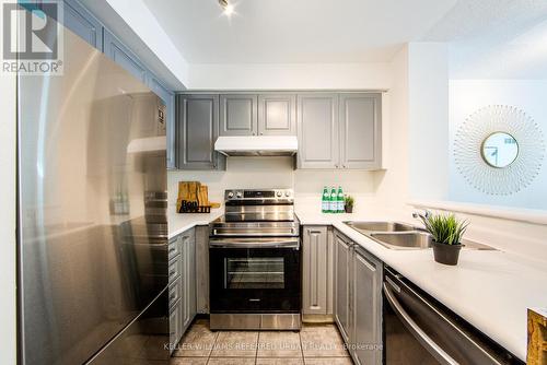 703 - 11 Lee Centre Drive, Toronto, ON - Indoor Photo Showing Kitchen With Double Sink With Upgraded Kitchen