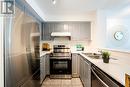 703 - 11 Lee Centre Drive, Toronto, ON  - Indoor Photo Showing Kitchen With Double Sink With Upgraded Kitchen 