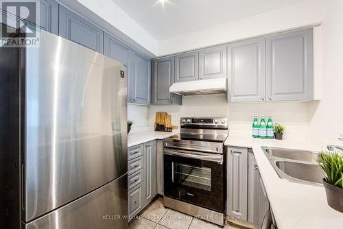 703 - 11 Lee Centre Drive, Toronto, ON - Indoor Photo Showing Kitchen With Double Sink With Upgraded Kitchen