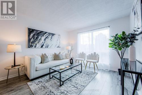 703 - 11 Lee Centre Drive, Toronto, ON - Indoor Photo Showing Living Room