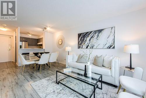 703 - 11 Lee Centre Drive, Toronto, ON - Indoor Photo Showing Living Room