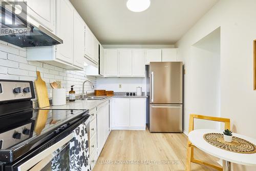 195 Bridletowne Circle, Toronto, ON - Indoor Photo Showing Kitchen With Stainless Steel Kitchen With Double Sink