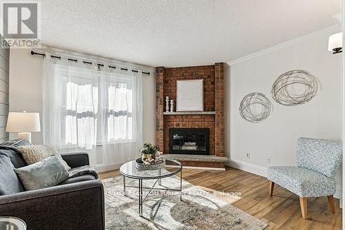 21 Sunbird Boulevard, Georgina, ON - Indoor Photo Showing Living Room With Fireplace